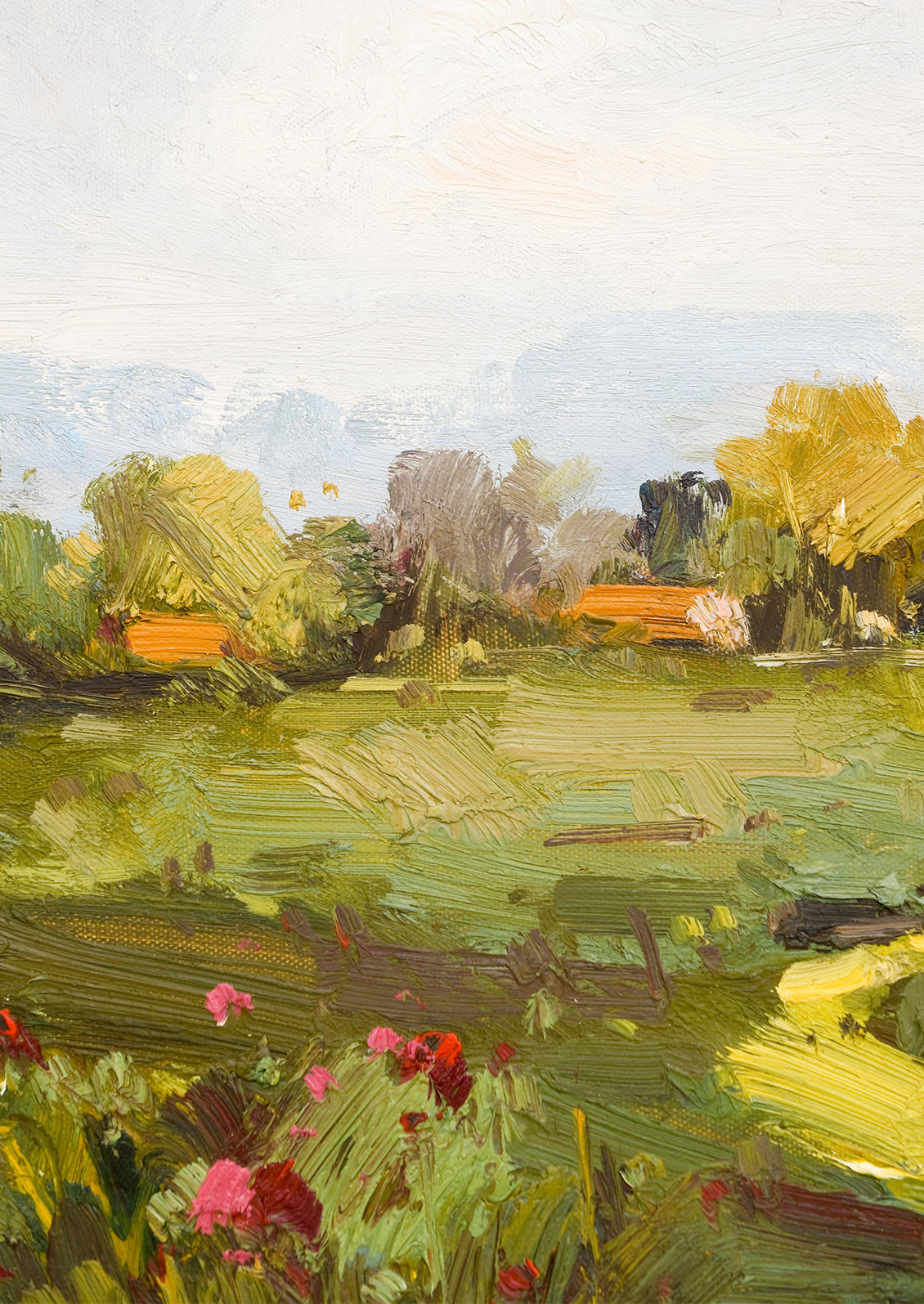 An original oil painting of a landscape in the country.