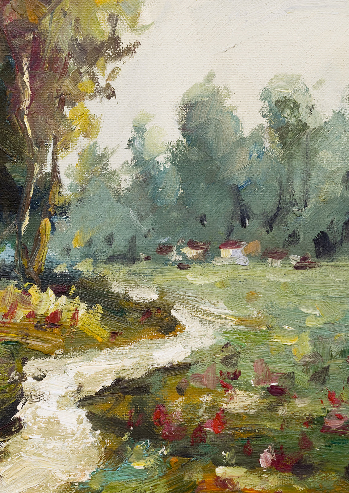 A framed landscape oil painting of a path running through a flowery meadow.