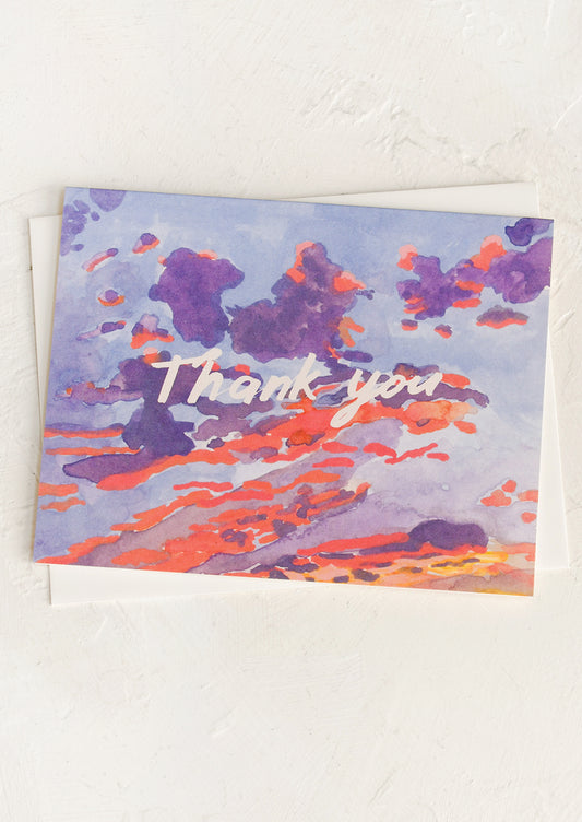Greeting card with watercolor design and 'Thank you' text on a white background