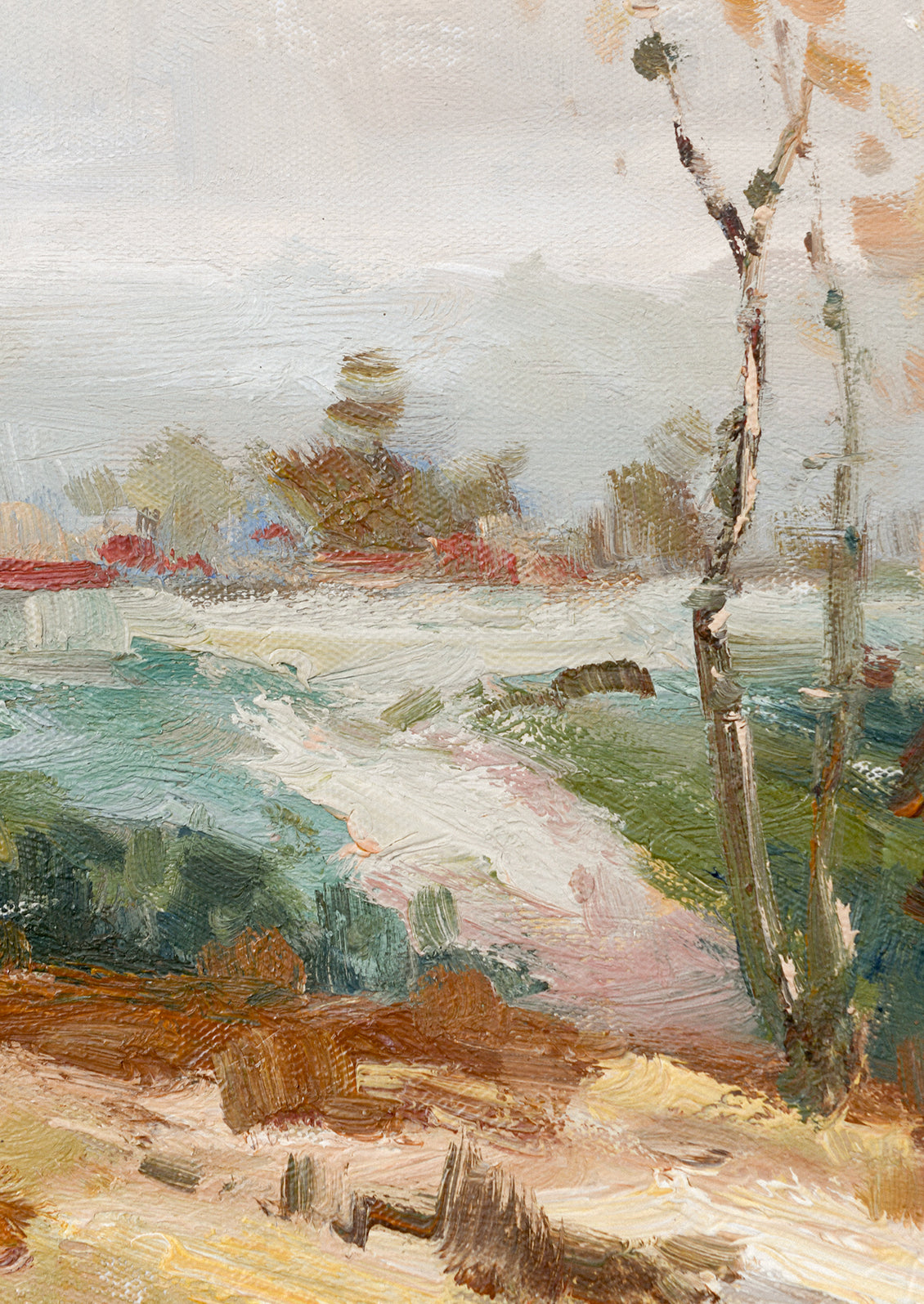 A framed landscape oil painting.