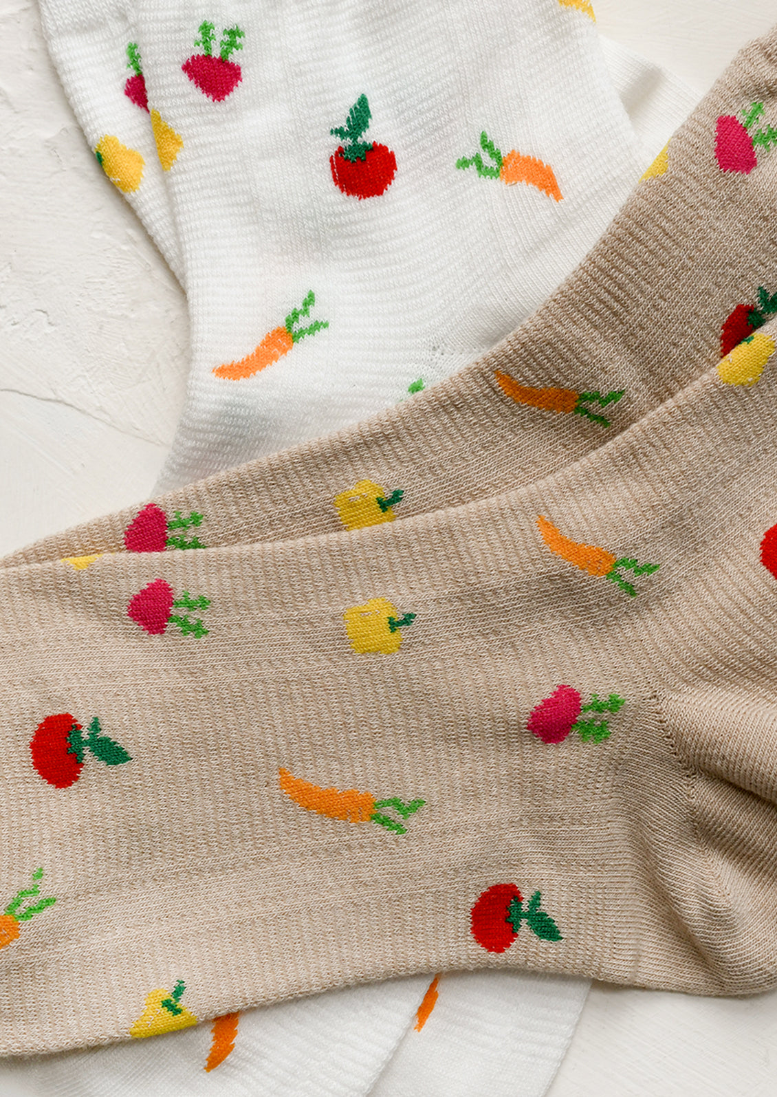 Ankle socks with all over vegetable motif.