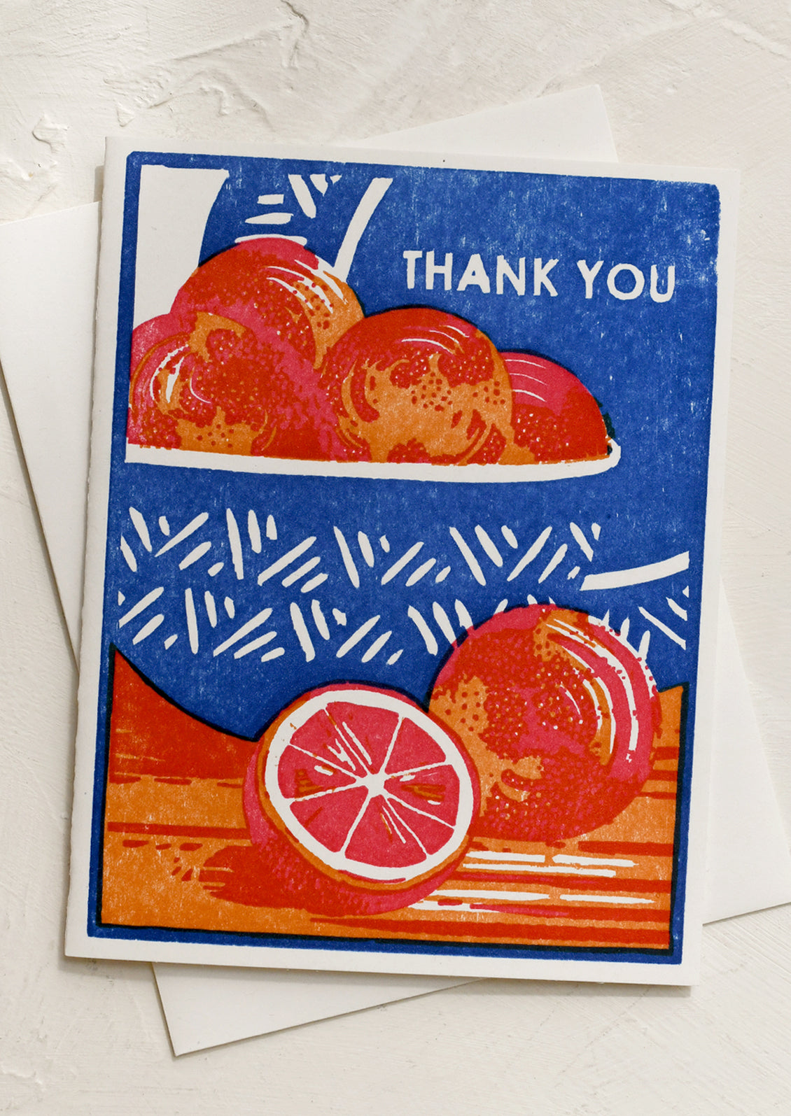 A set of woodcut stamped greeting cards, with image of bowl of oranges and text reading "Thank you".