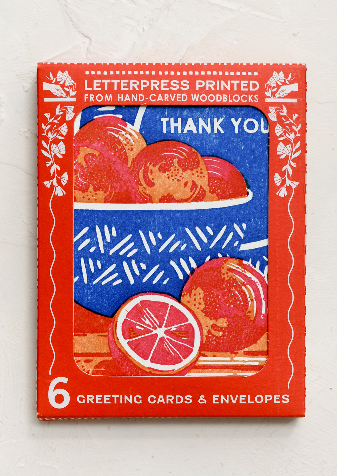 A set of woodcut stamped greeting cards, with image of bowl of oranges and text reading "Thank you".