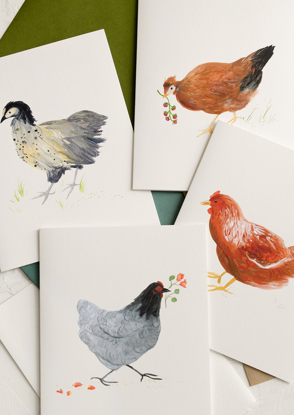 A set of greeting cards with illustrated chicken theme.