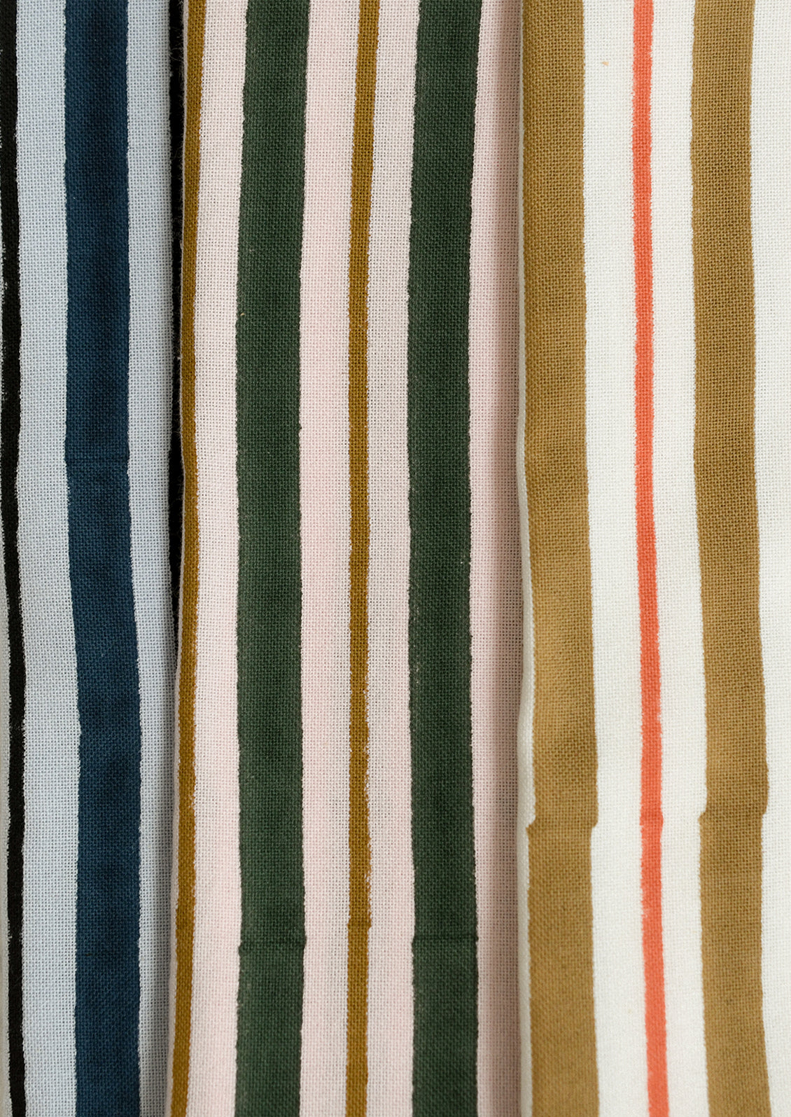 Striped napkins in three colors.