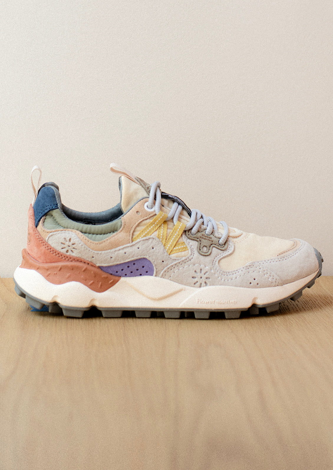 A pair of sporty sneakers in multicolor pastels.