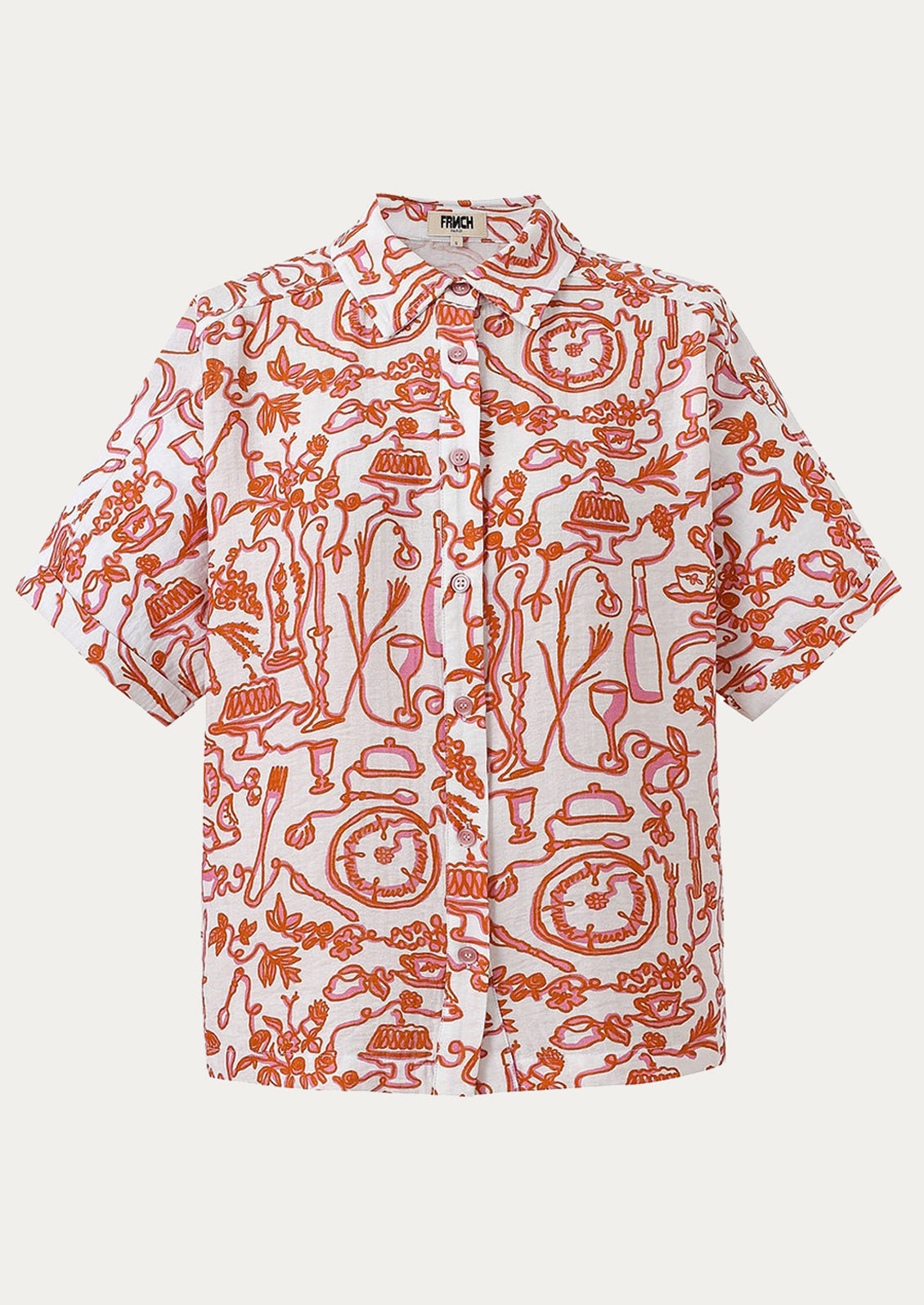 A short sleeve button front shirt with pink and orange set the table print.