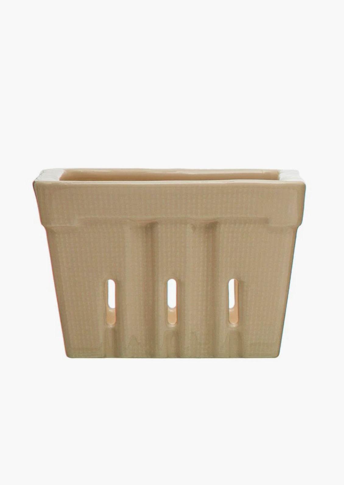 A ceramic berry basket in cream.