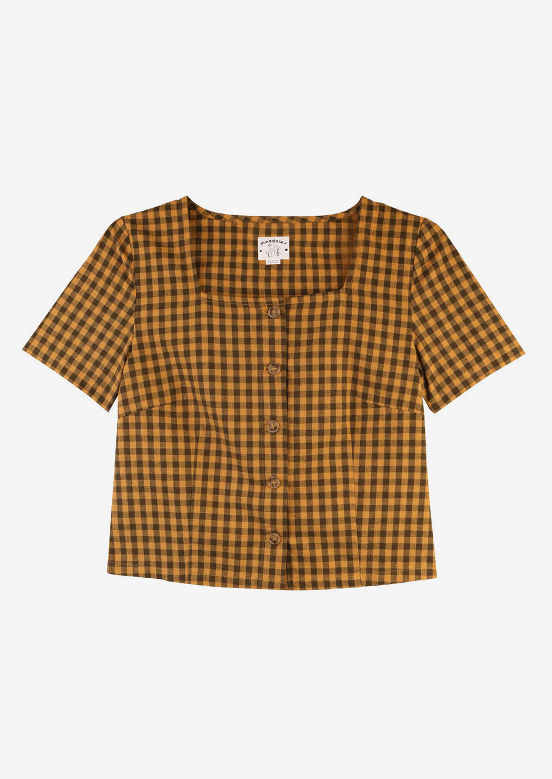 A short sleeve, square neck top in mustard and brown gingham.