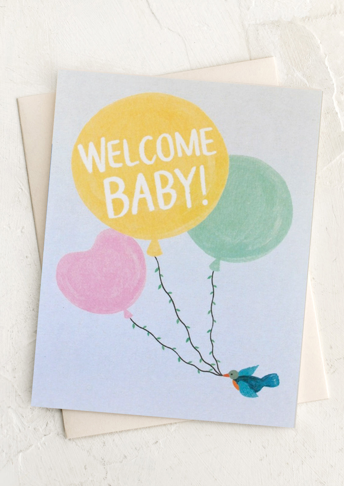 Greeting card with colorful balloons and 'Welcome Baby!' text on a light background