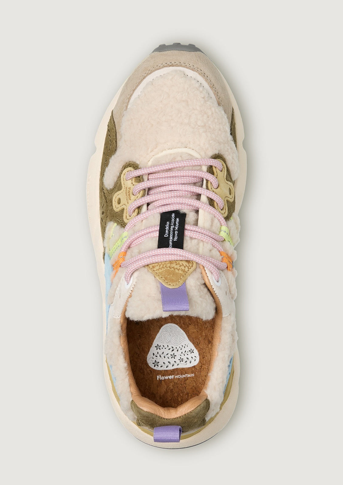A pair of sporty sneakers in pastel multicolor with cream shearling upper.