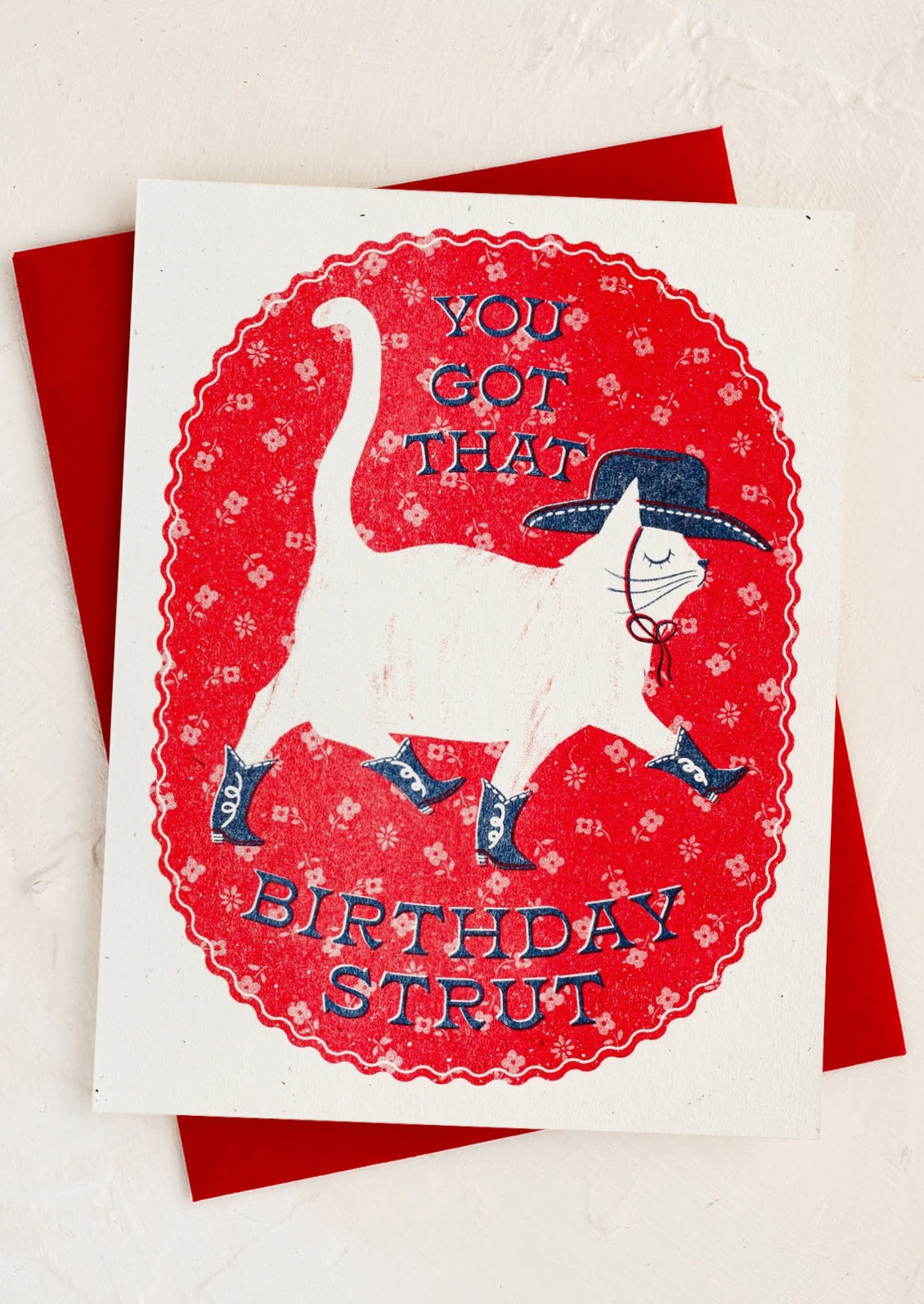 A cat print card, text reads "You got that birthday strut".