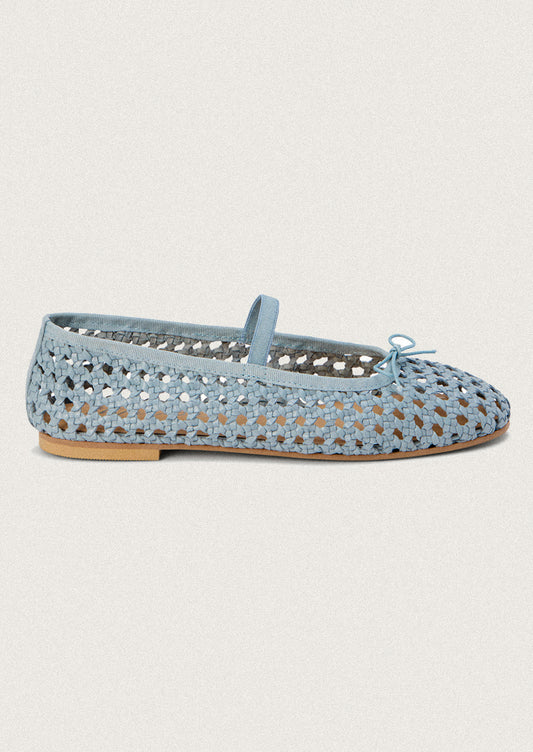 A pair of open weave leather ballet flats in powder blue.