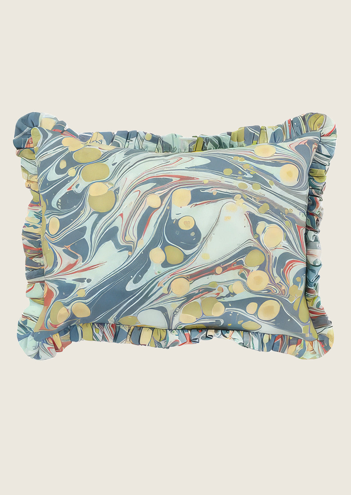Marbled patterned pillow with ruffled edges on a light background