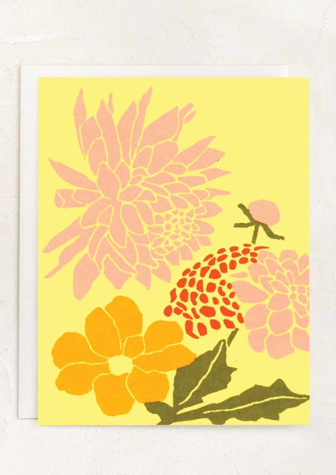 A yellow greeting card with floral bouquet illustration.