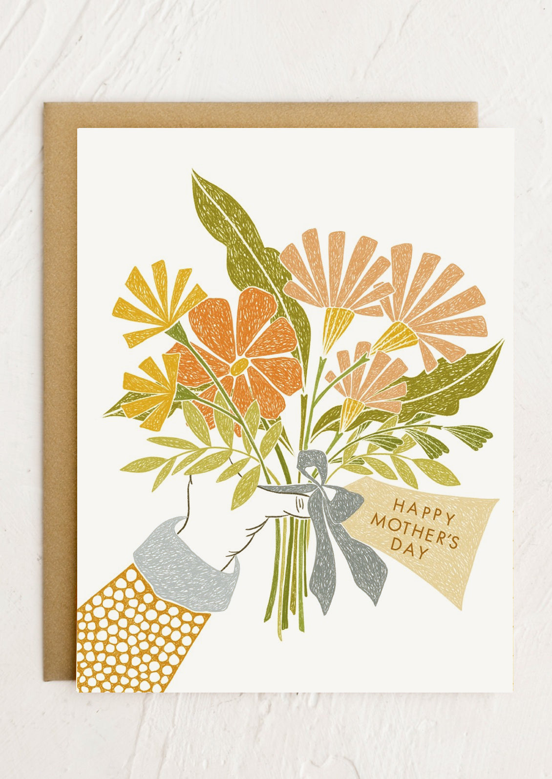 A card with illustration of hand holding bouquet of flowers, text reads "Happy Mother's Day".