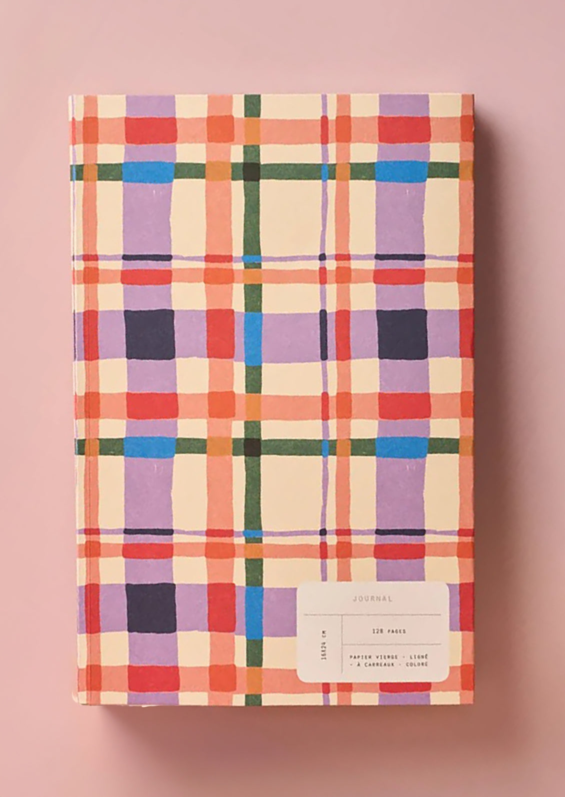 A notebook with colorful plaid print cover.