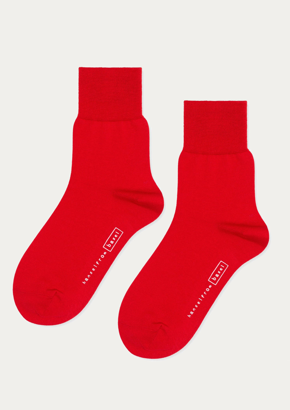 A pair of classic socks in bright red.