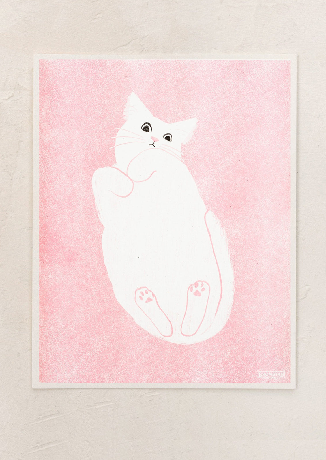 A risograph art print with pink background and white cat.