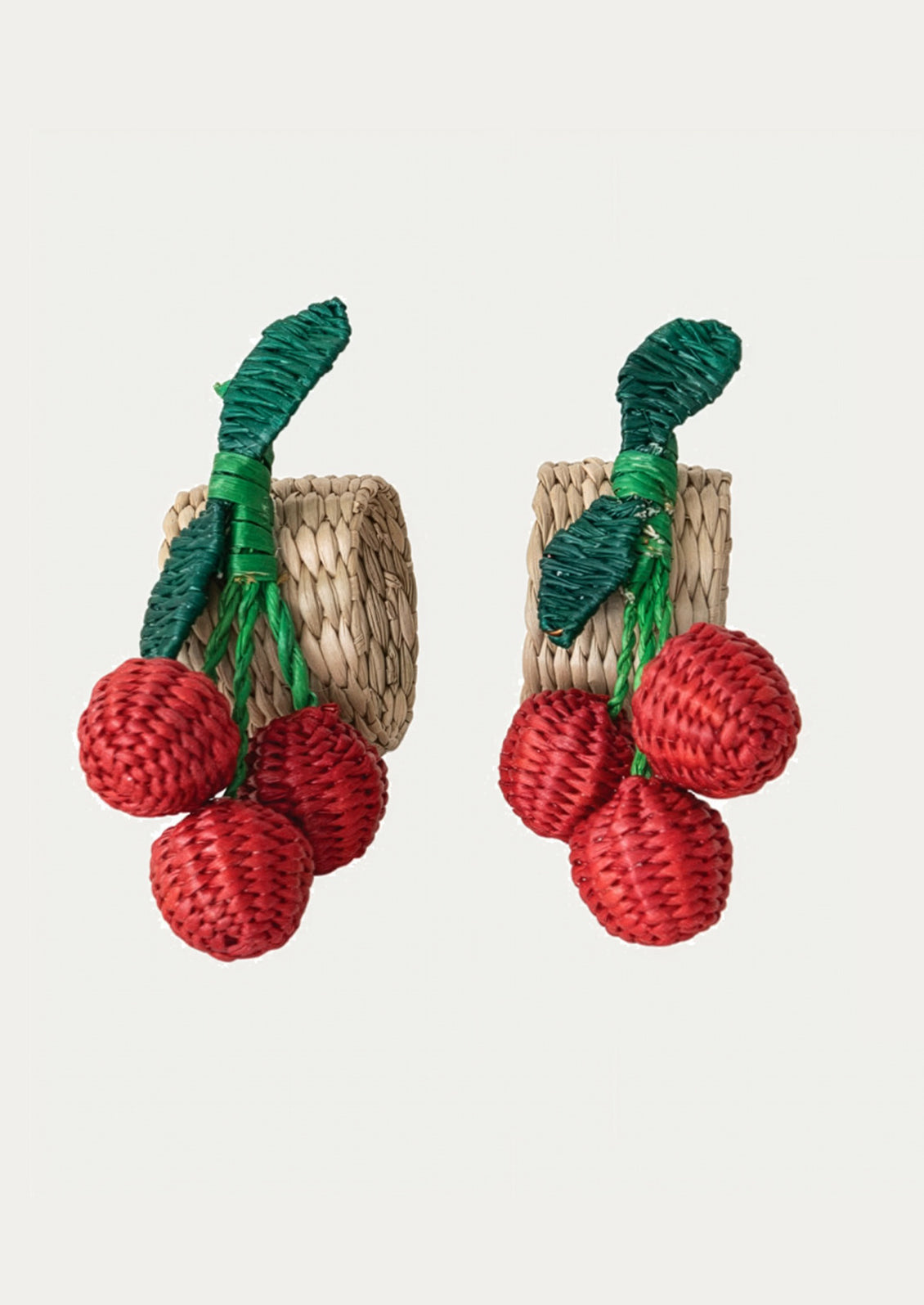 Woven napkin rings shaped like cherries 