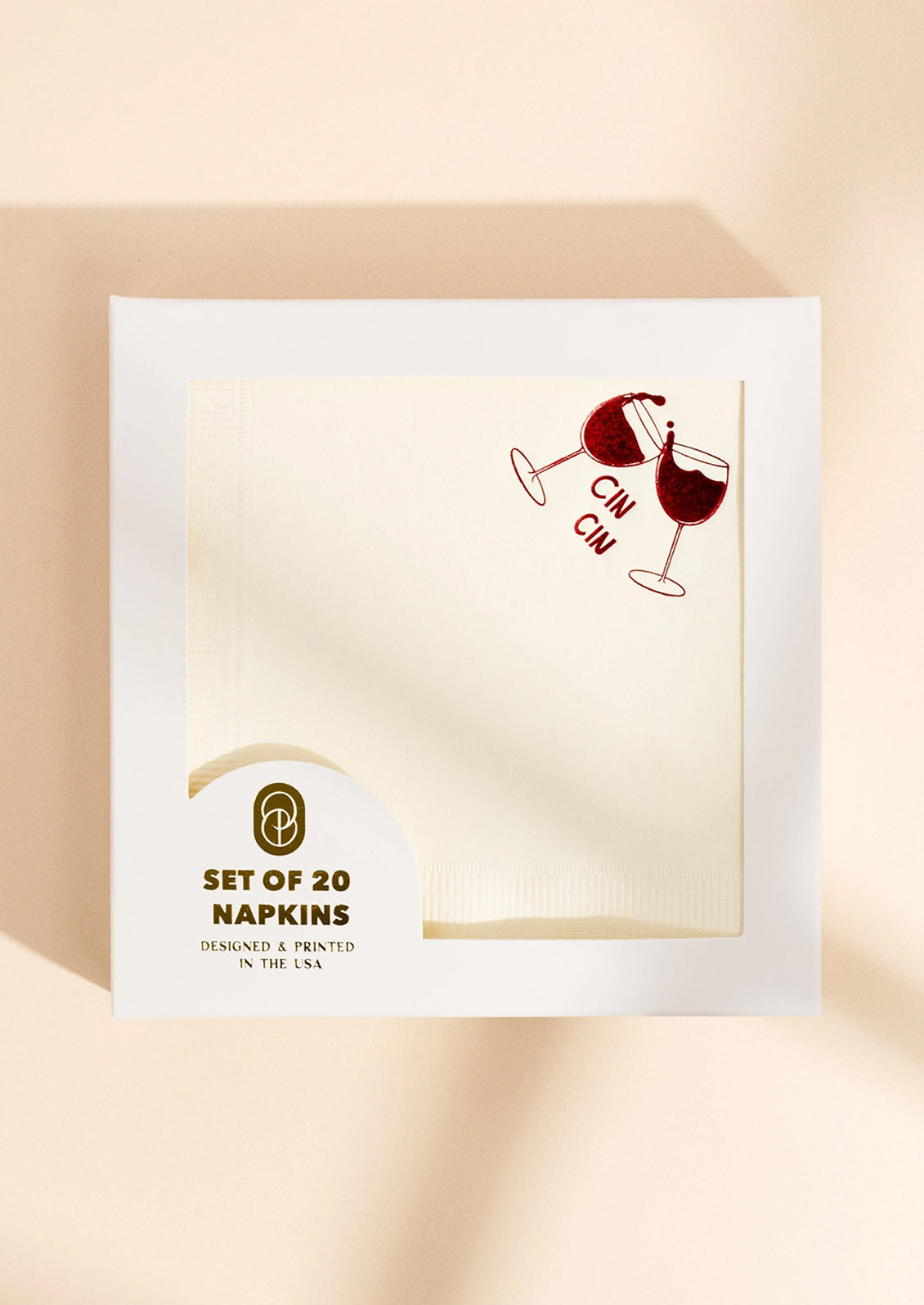 Packaging of a set of 20 napkins with wine glass design and text on a beige background