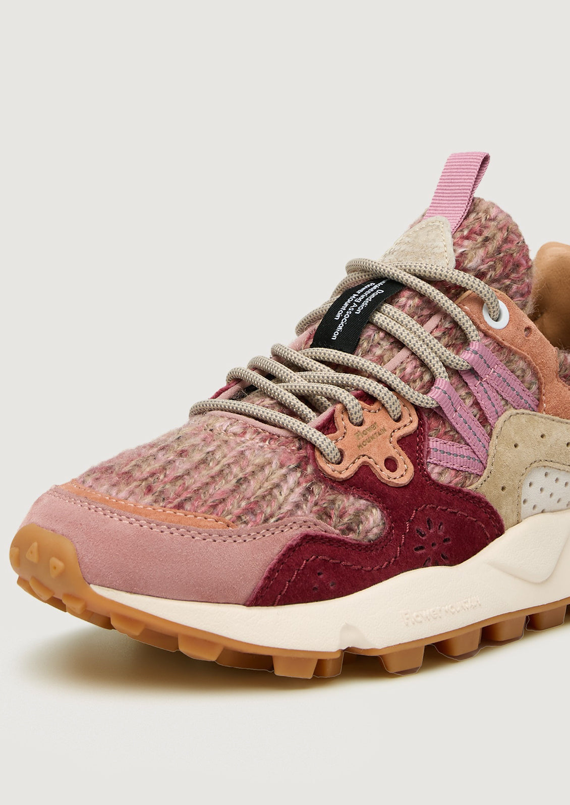 A pair of sporty chunky sneakers in pink wool knit multi.