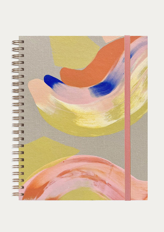 A linen bookcloth notebook with yellow and peach hand painted design.