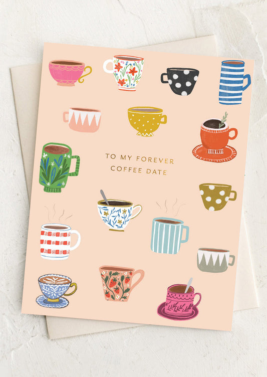 Greeting card with colorful coffee cup illustrations and text 'To my forever coffee date' on a light background.