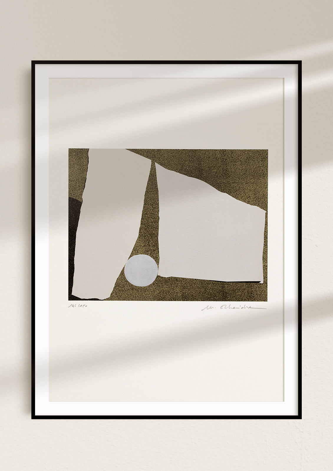 An abstract art print featuring asymmetrical shapes in black and grey.