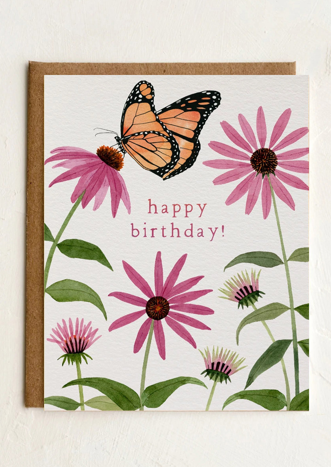 Greeting card with a butterfly and pink flowers on a white background