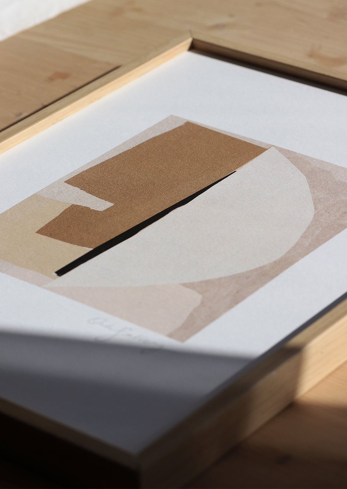 An abstract art print in neutral colors.