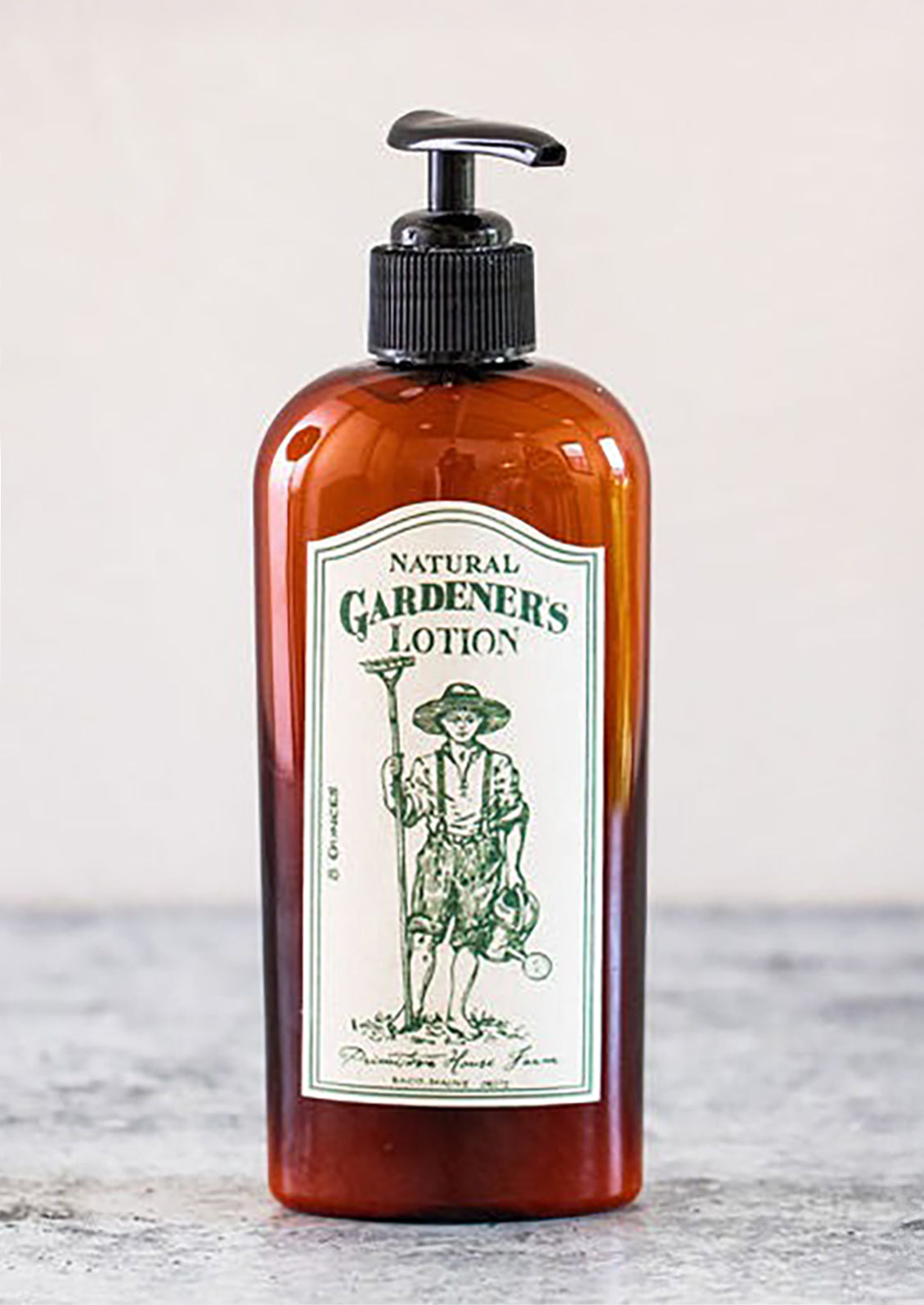 A bottle of lotion with analog style label reading Natural Gardener's Lotion.
