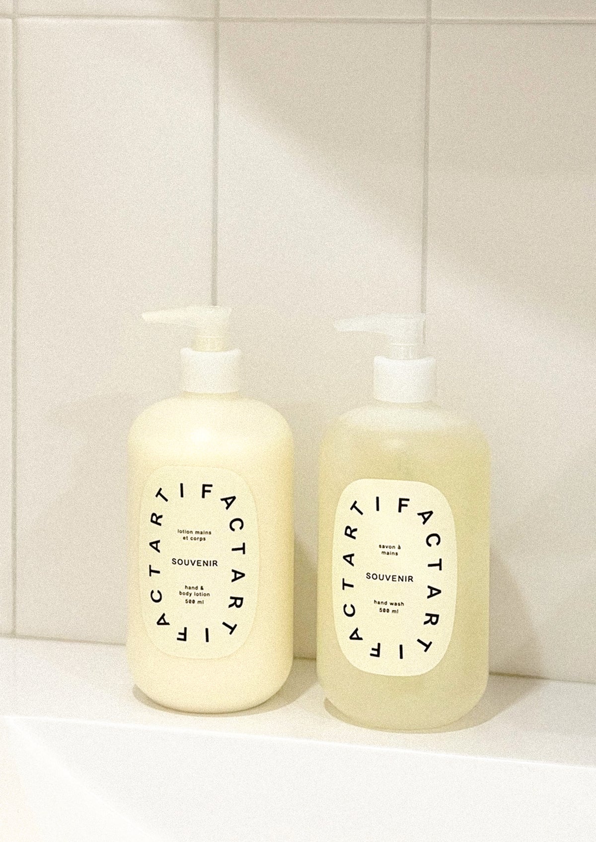A pump bottle of lotion in Souvenir scent.