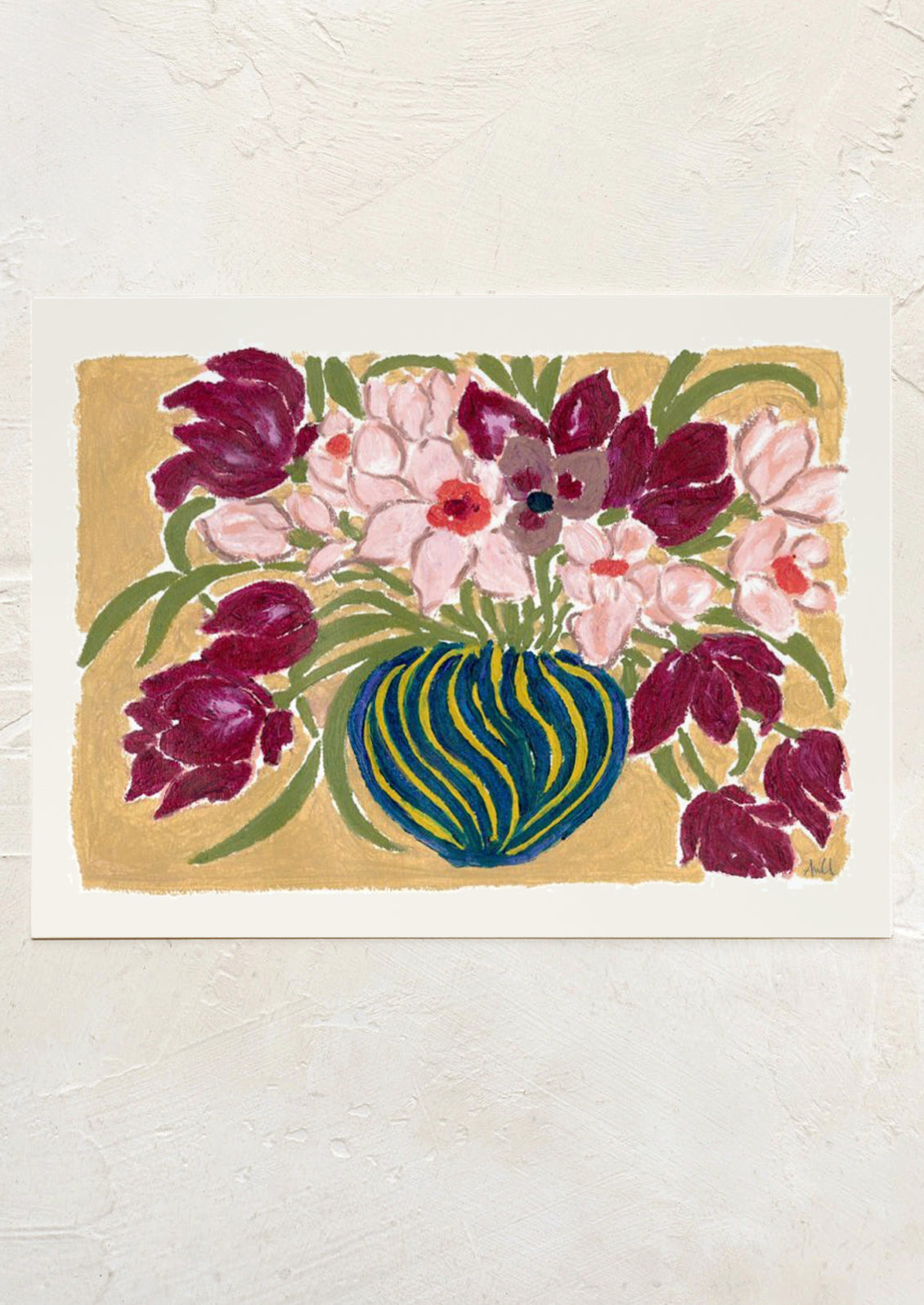 Decorative doormat with floral design on a textured wall background