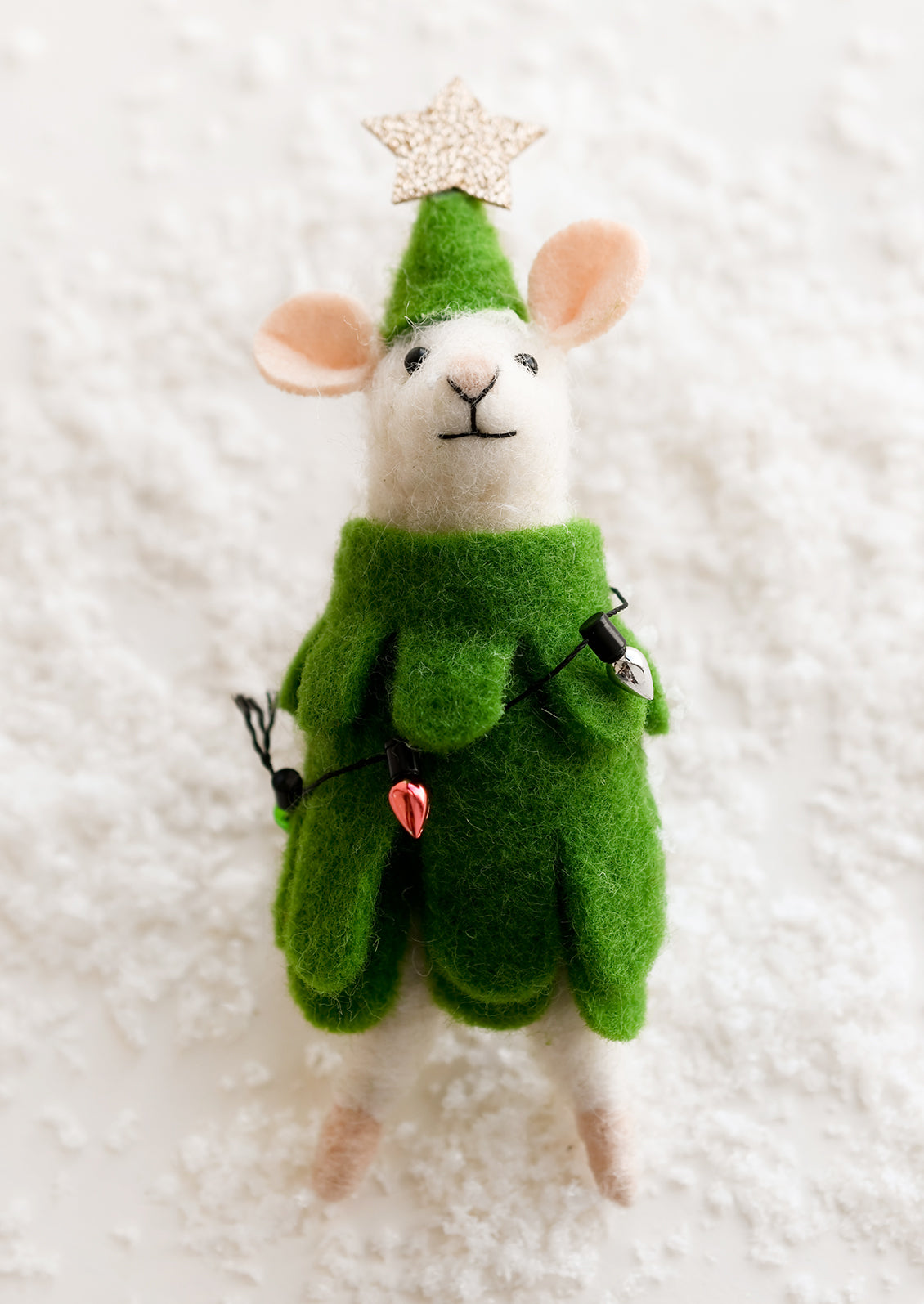 A felted mouse ornament dressed up as a Christmas tree.