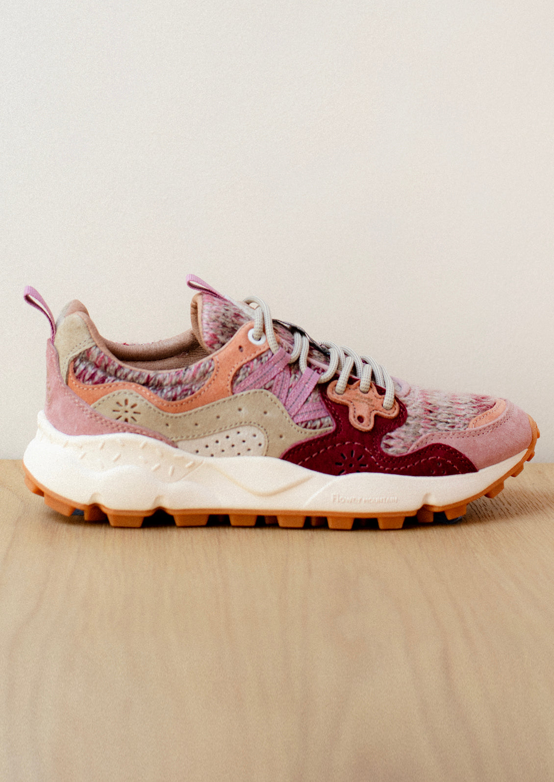 A pair of sporty chunky sneakers in pink wool knit multi.