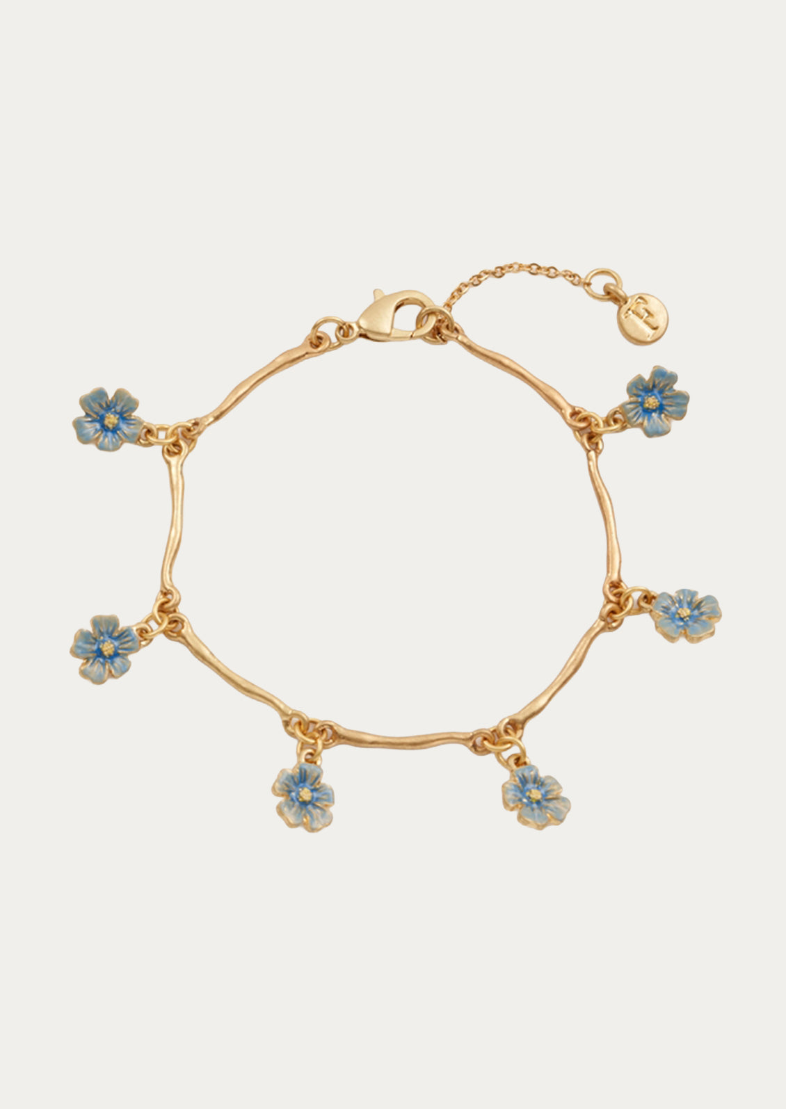 A gold bracelet with blue flower charms.