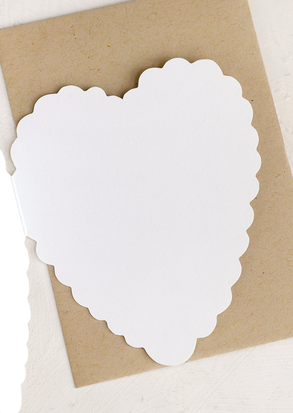 A folded heart shaped card.