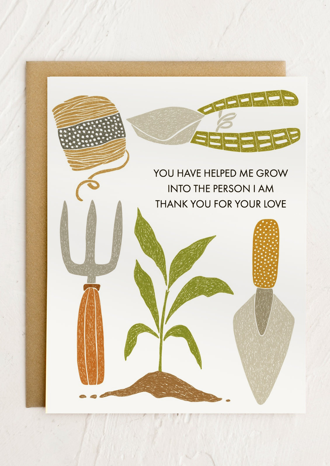 A card reading "You have helped me grow into the person I am today, thank you for your love".