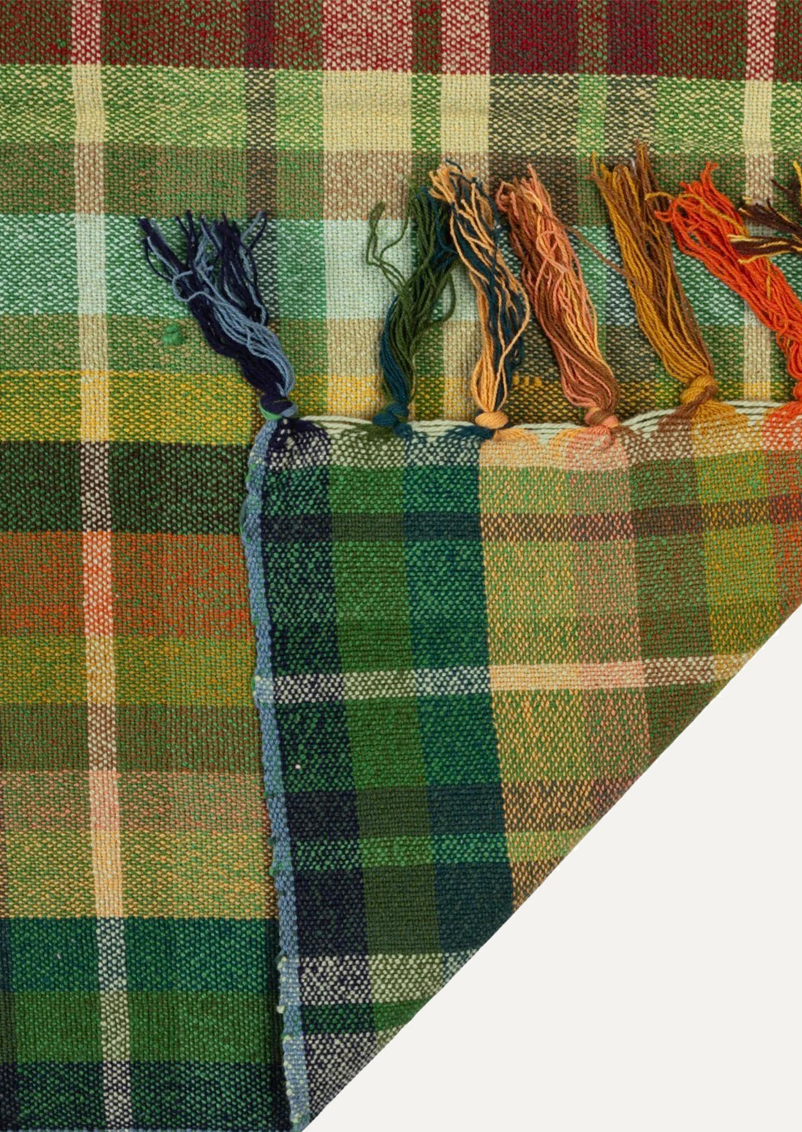 Color swatches on a plaid fabric background
