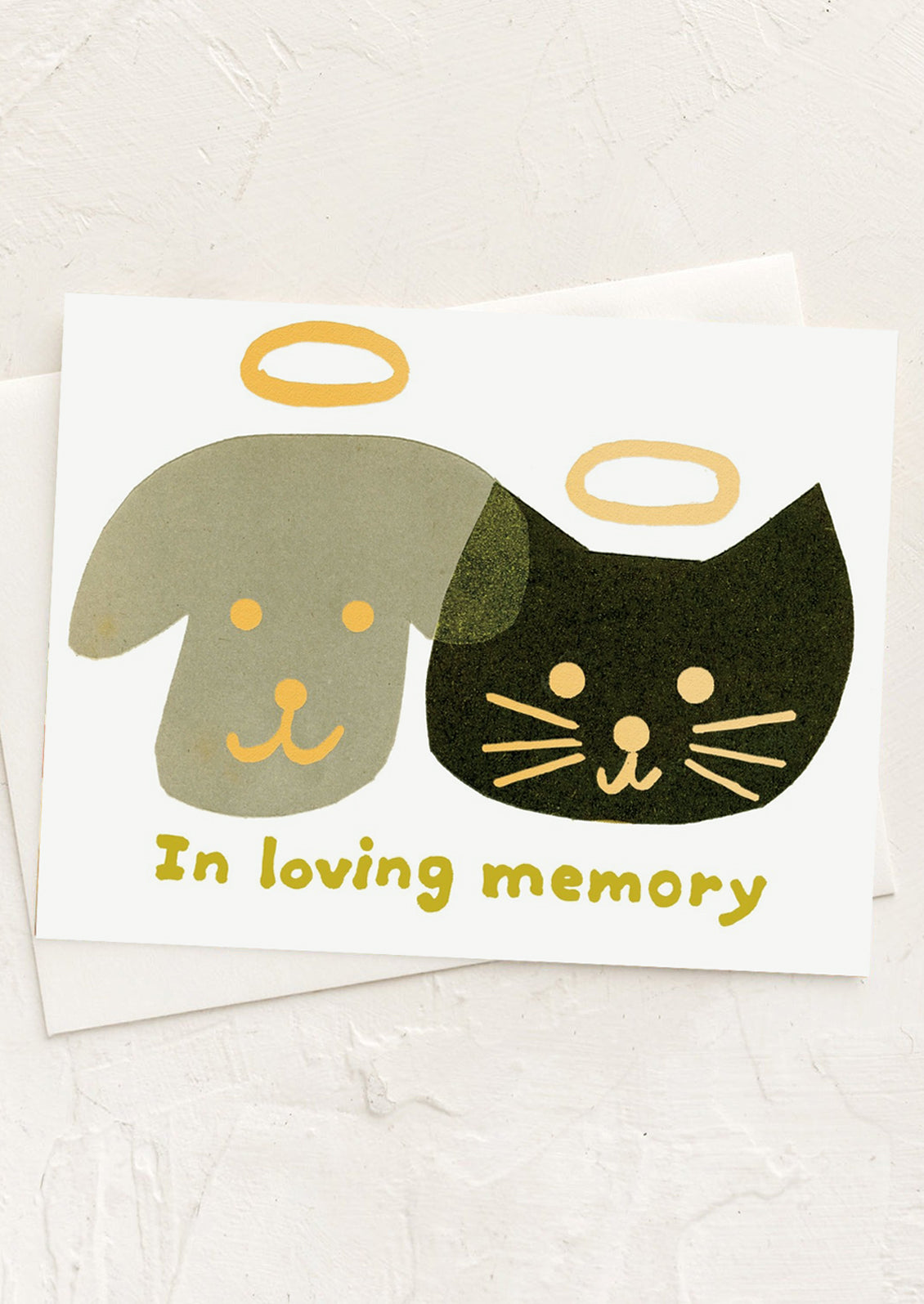 A card with image of dog and cat faces with halos above them, text reads "In loving memory".