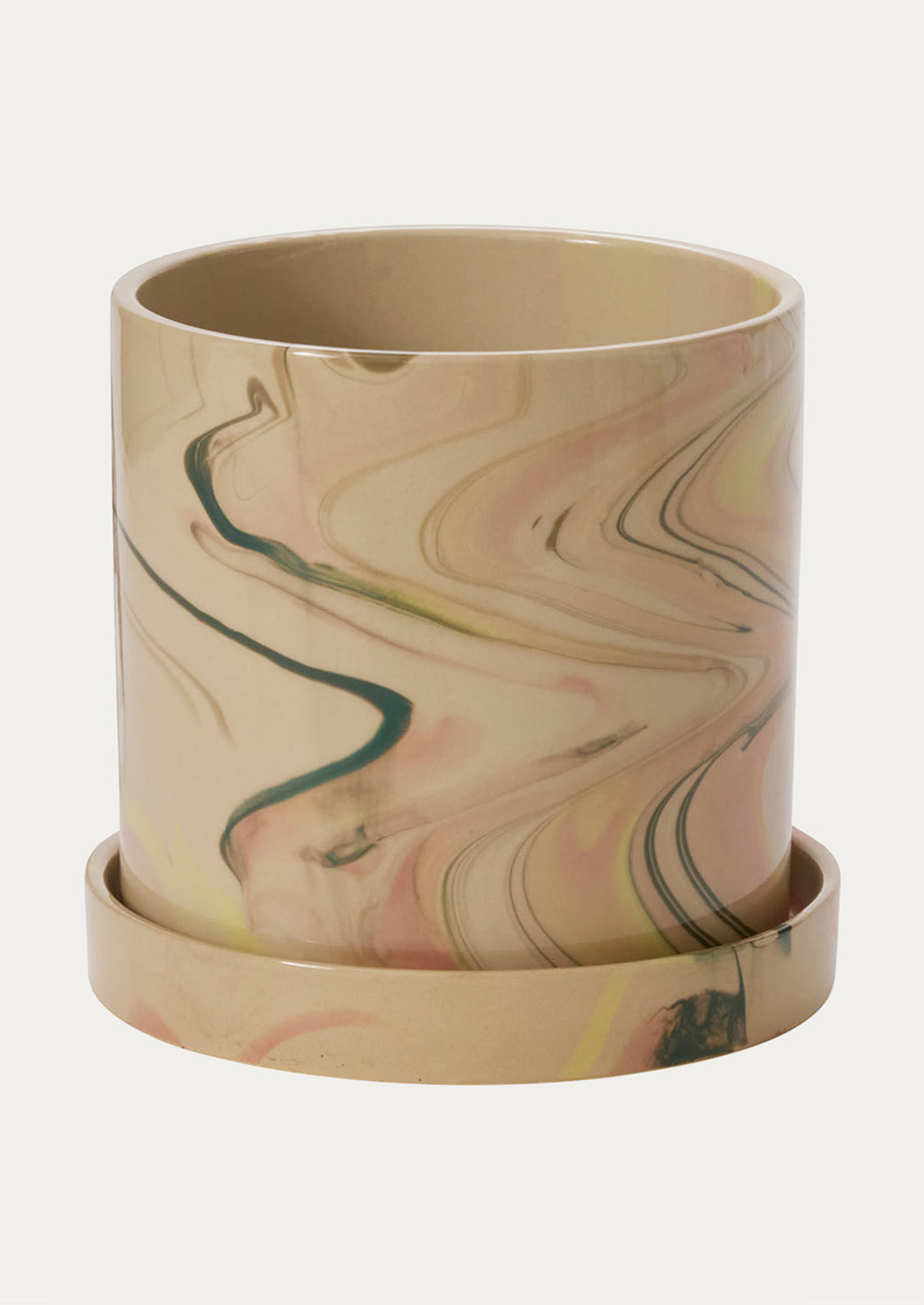 A ceramic planter in tan with pastel marbleized pattern.