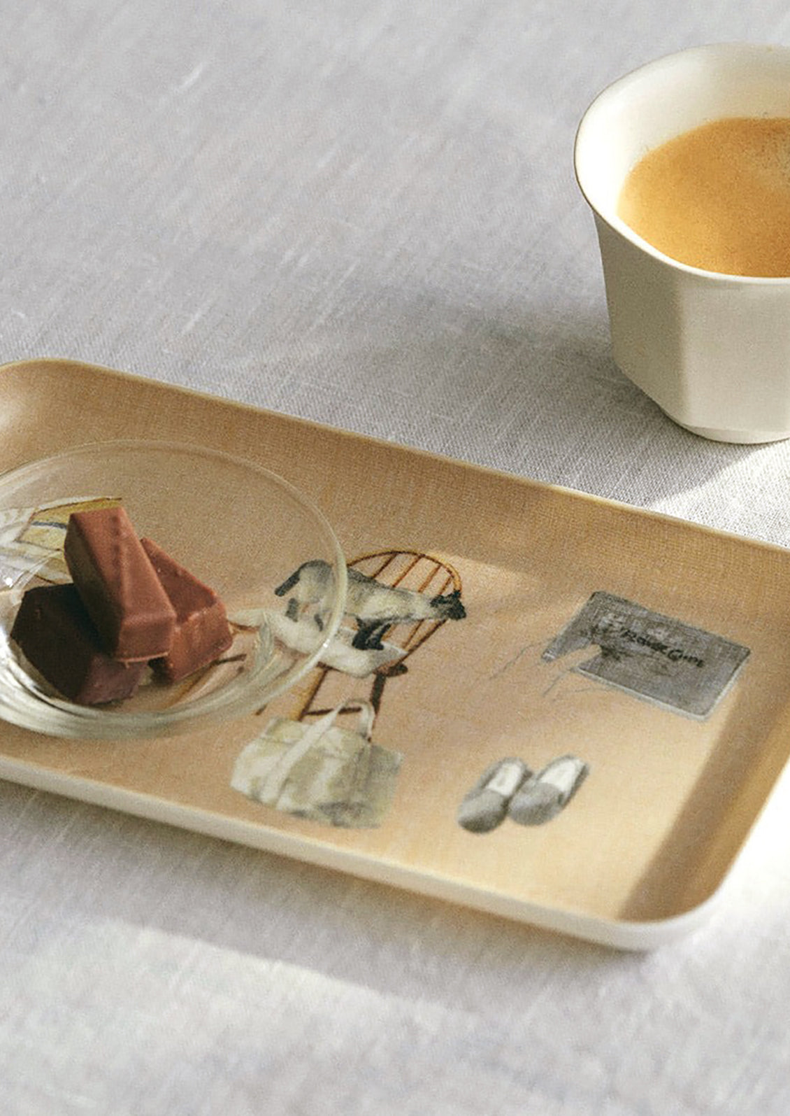 A rectangular tray with quirky cat print.