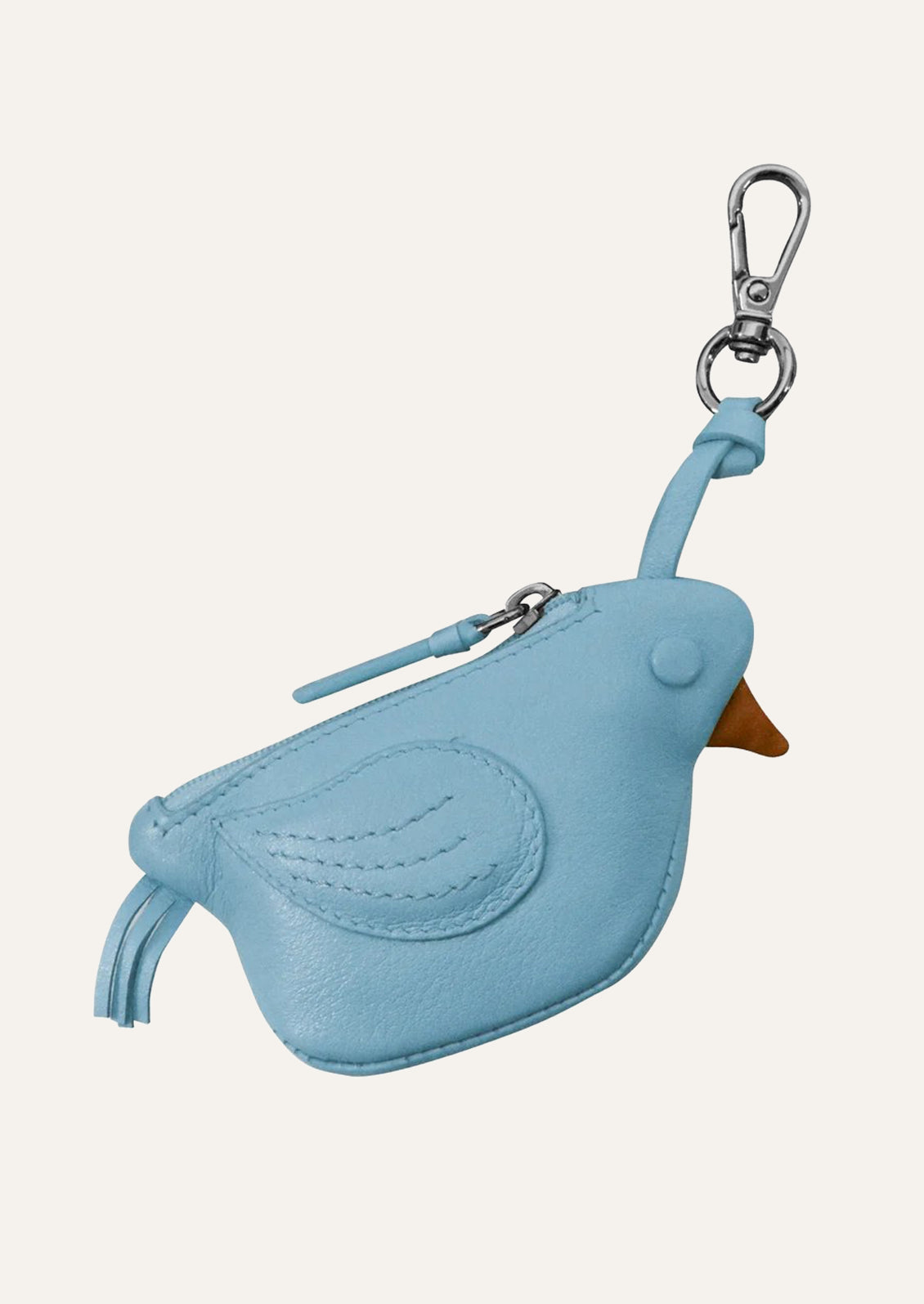 A small sky blue leather pouch in the shape of a canary.