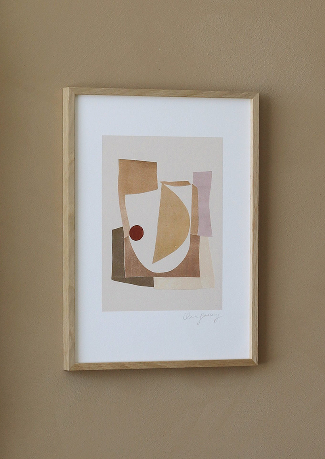 An abstract art print featuring abstract shape formation in tones of brown and cream.