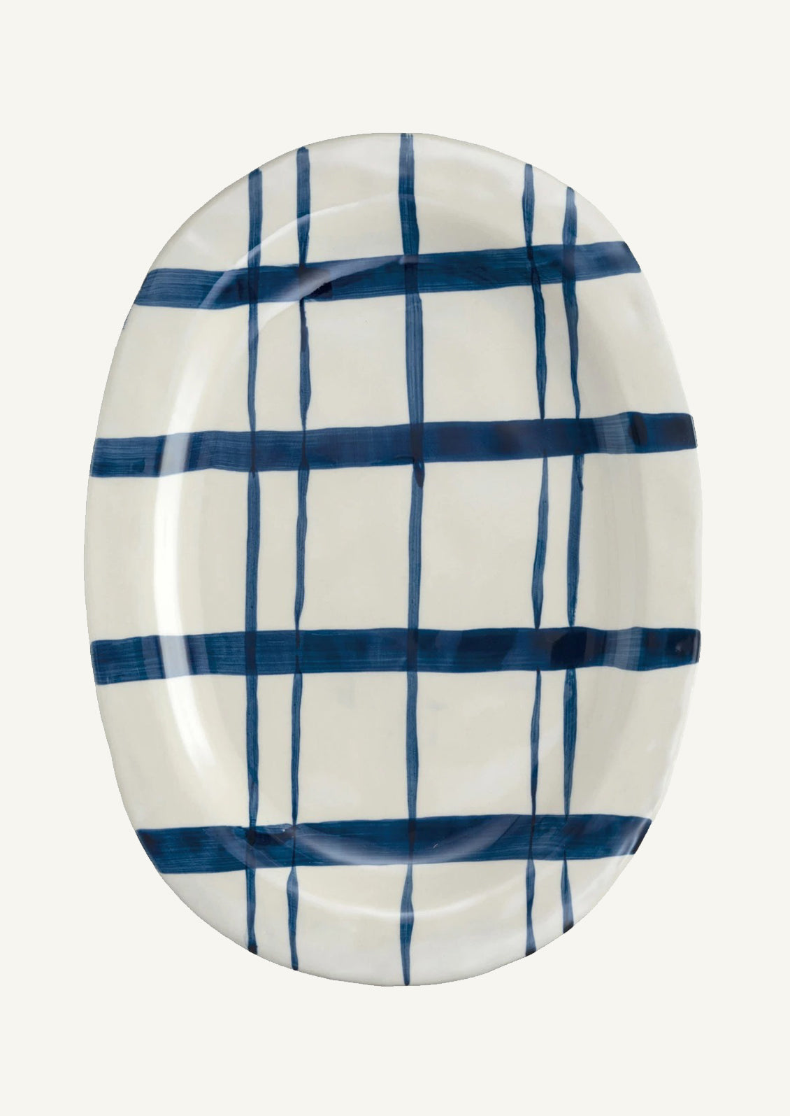 An oval patter with cobalt grid pattern.