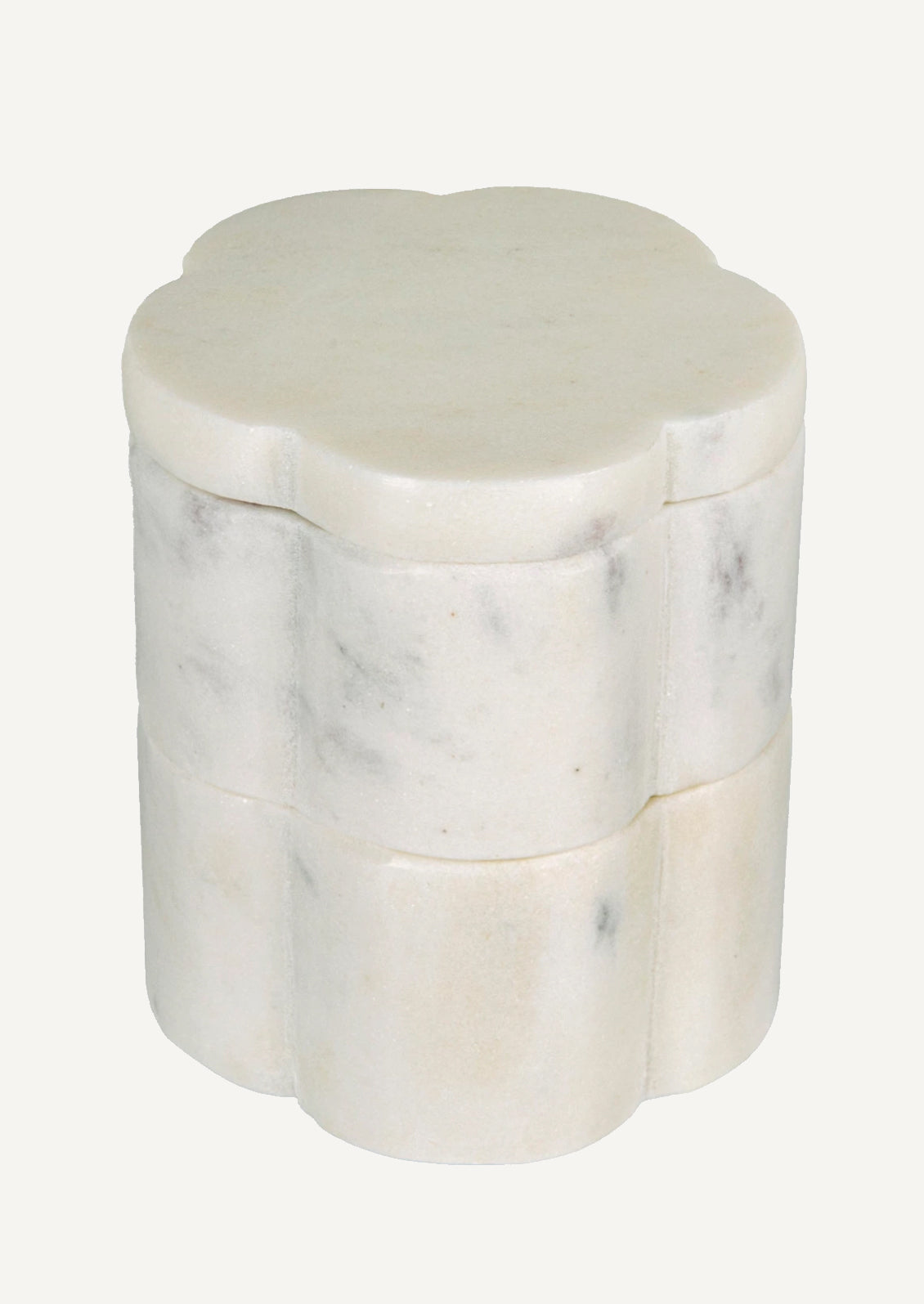 A stacked set of two flower-shaped marble pinch pots with lid on top.