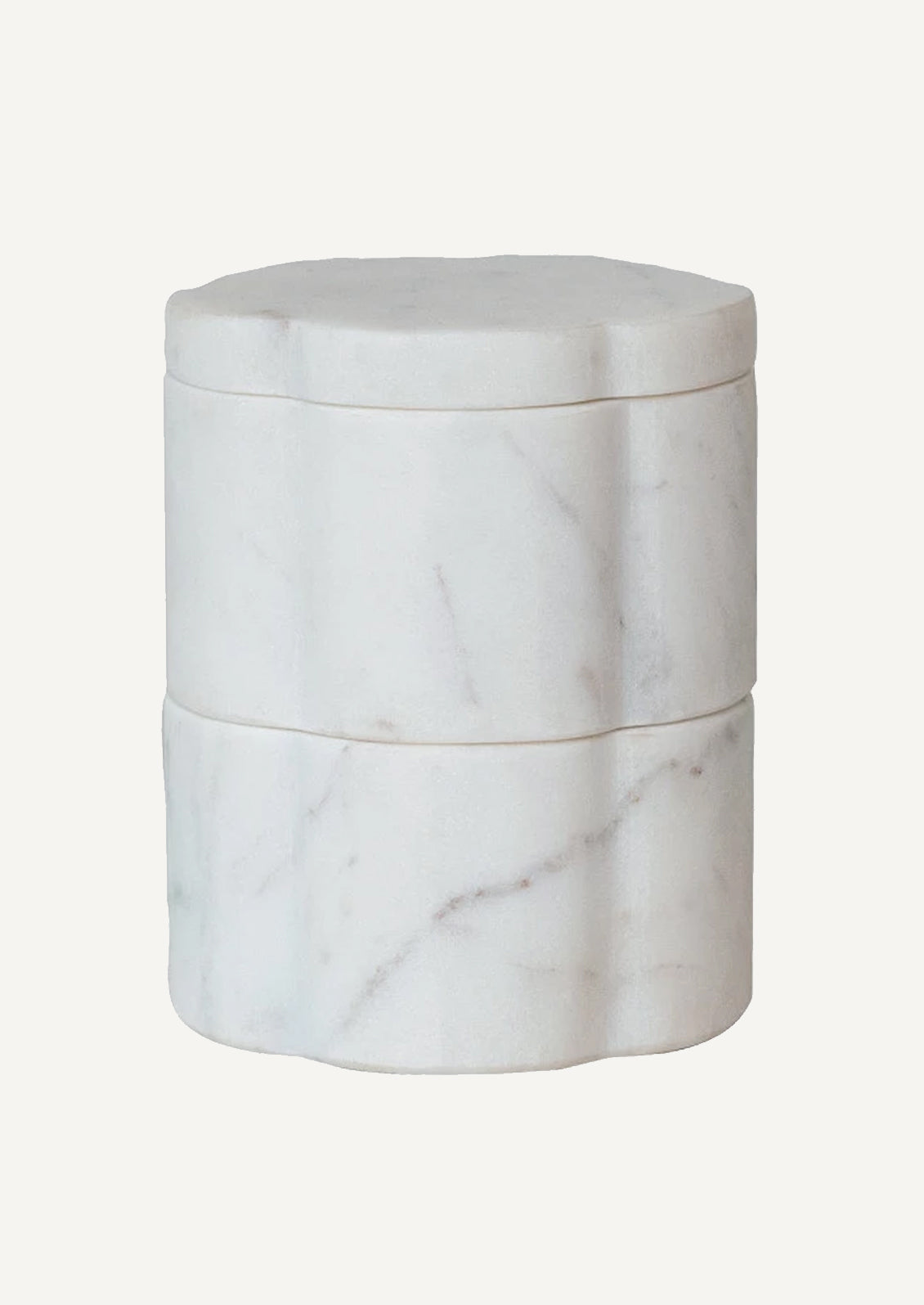 A stacked set of two flower-shaped marble pinch pots with lid on top.
