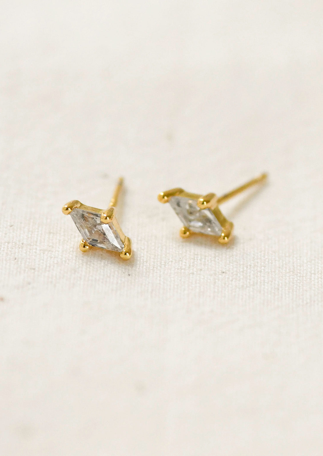 A pair of marquise stud earrings.