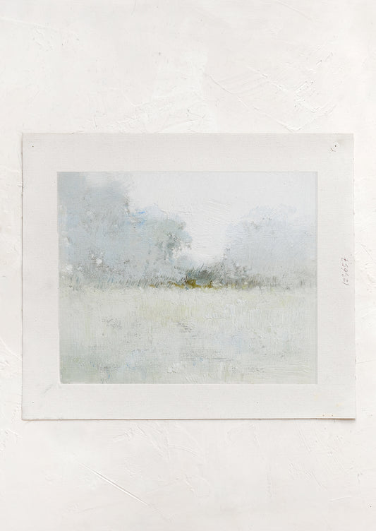 An original oil painting on unstretched canvas of pastel colored landscape.